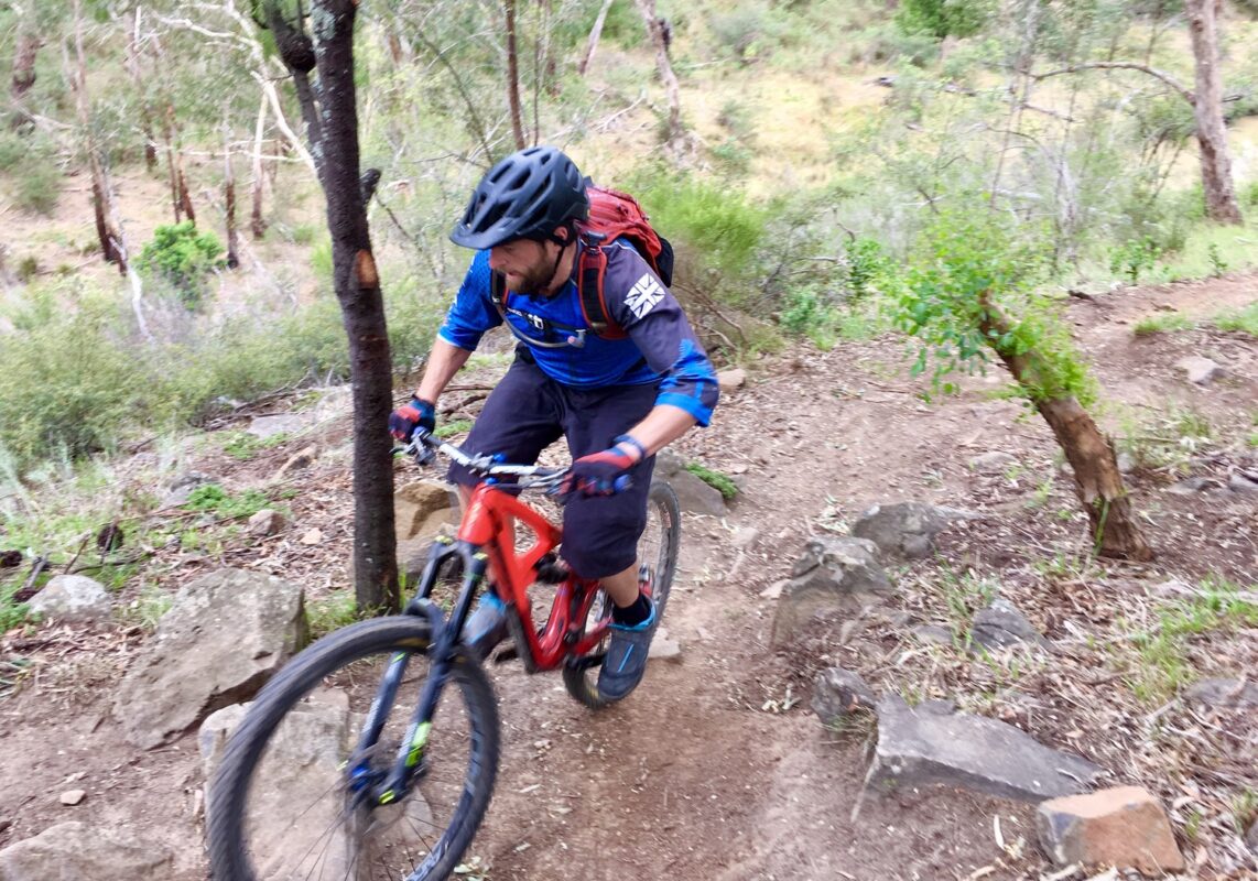 Mountain biker riding mountain bike trails in Melbourne, at Plenty Gorge