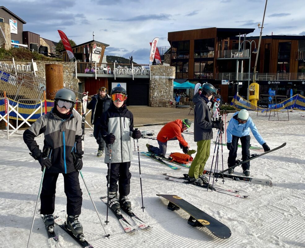 Group of Skiers and boarders at Falls Creek Snow Resort at base of Halleys Comet chair.