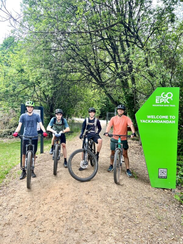 Four mtb riders at the Indigo Epic trailhead in Yackandandah.