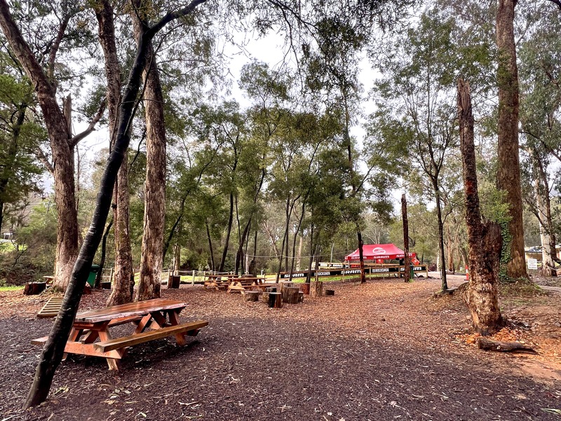 View of the seating and tents for the Bight Mystic MTB park shuttle pick up